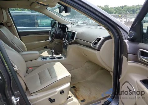 2015 Jeep Grand Cherokee Overland из США, поврежденный, VIN 1C4RJFCG5FC234657